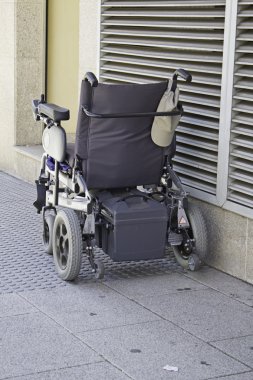 Powered wheelchair clipart