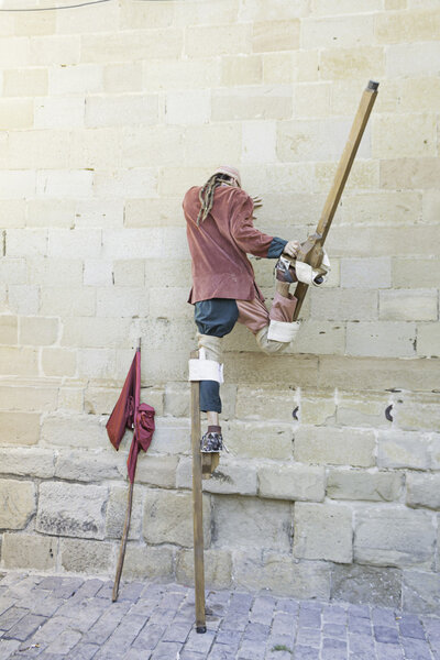 Juggler on stilts