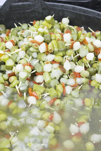 Olives and onion with pepper — Stock Photo, Image