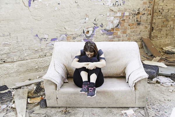 Woman in abandoned house