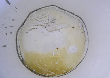 Detail of bucket stained with white paint, art and decoration