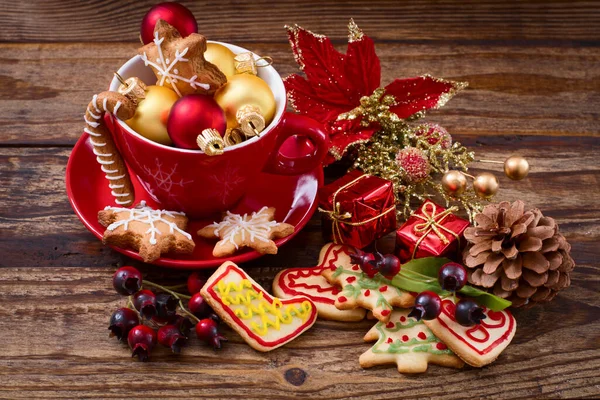 Knar and christmas food sweet cookies on wooden table background. Copy space. Selective focus. Happy new year concept.