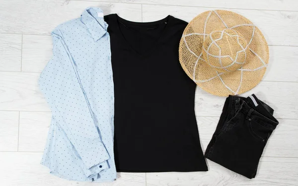 Black t-shirt mock up top view, summer hat, sunglasses. Tshirt mockup top-view, empty for logo.