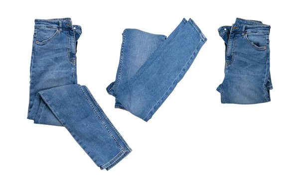 Eine Reihe Blauer Jeans Auf Weißem Hintergrund — Stockfoto