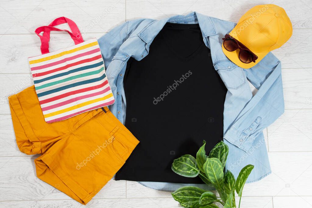 Tshirt t-shirt t shirt mock up top view on wooden floor, clothes background copy space shirt flatlay