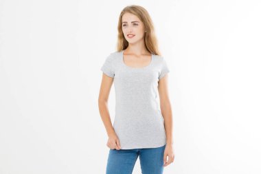 Young blonde woman with fit slim body in blank template t shirt and jeans isolated on white background. Skin and hair care. Copy space and mock up