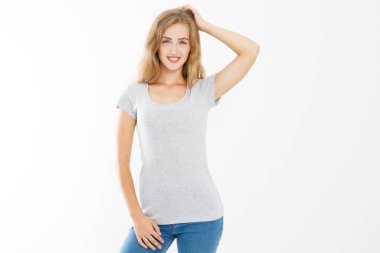 Young blonde woman with fit slim body in blank template t shirt and jeans isolated on white background. Skin and hair care. Copy space and mock up