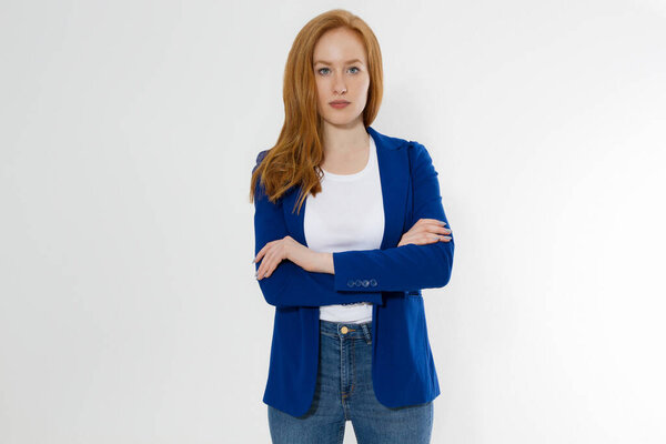 Woman in white t shirt and black leather jacket isolated on white background. Red hair girl in fashion clothes front view. Blank template summer t-shirt. Copy space