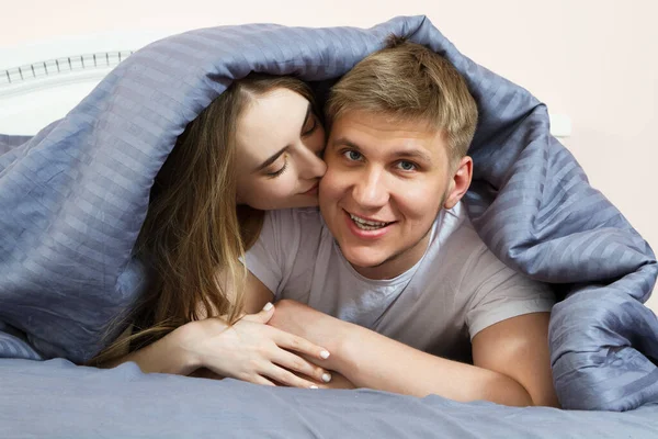 Young Woman Kisses His Man Husband Bed Morning Bedroom Young Stock Image