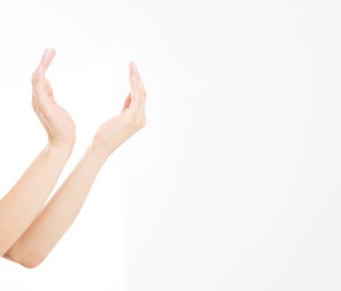 female hands measuring invisible items, woman's palm making gesture while showing small amount of something on white isolated background, side view, close-up, cutout, copy space