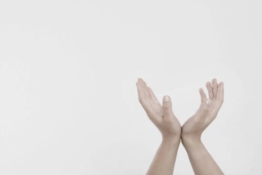 female hands measuring invisible items, woman's palm making gesture while showing small amount of something on white isolated background, side view, close-up, cutout, copy space