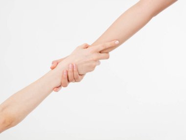 Two hands isolated. Helping hand to a friend. Copy space. Rescue or helping gesture of arms.
