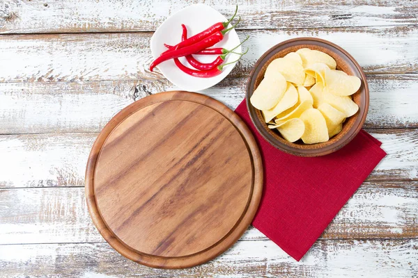 potato chips,red napkin, pizza desk on wooden table, holiday concept,mock up