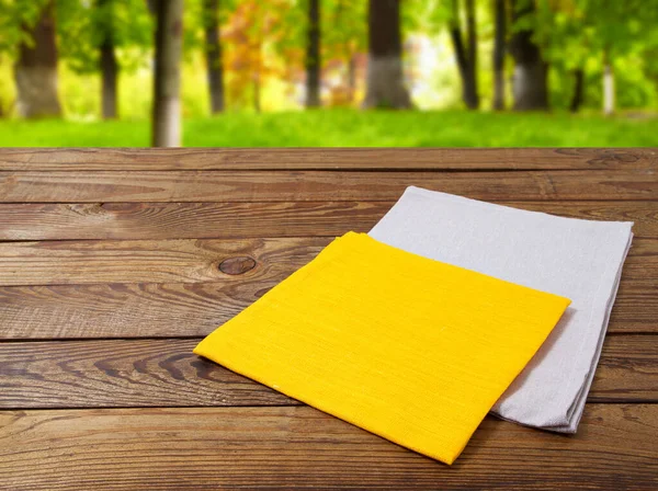 Yellow Grey Napkins Wooden Table Blurred Park Background — Stock Photo, Image