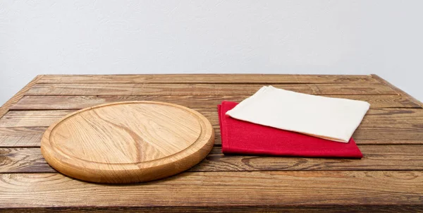 pizza desk, white and red napkin on table, tablecloth, copy space, empty