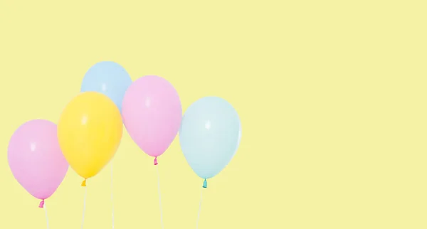 Coloured Balloon Isolated Yellow Background Copy Space Holiday Concept — Stock Photo, Image