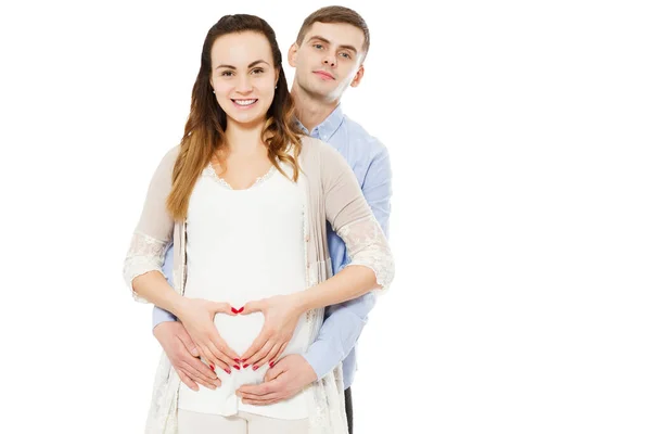 Glad Par Gør Hjerteform Den Gravide Mave Med Deres Hænder - Stock-foto