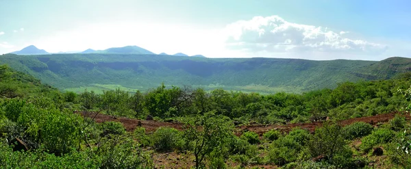 Mysterious origin crater between Moyale and Marsabitom. Africa, Kenya. — Stock Photo, Image