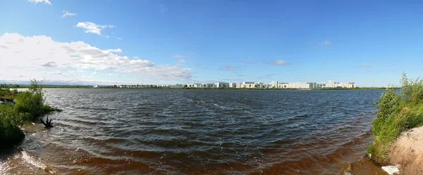 Nadym, Russia - July 18, 2008: the panorama of the city on the r — Stock Photo, Image