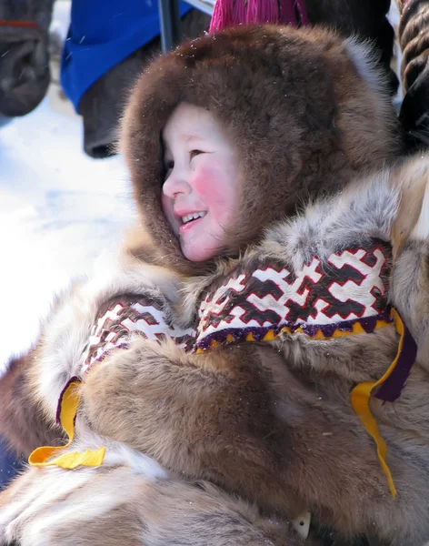 Nadym, Russia - March 11, 2005:  Unknown boy Nenets on the snowm — Stock Photo, Image