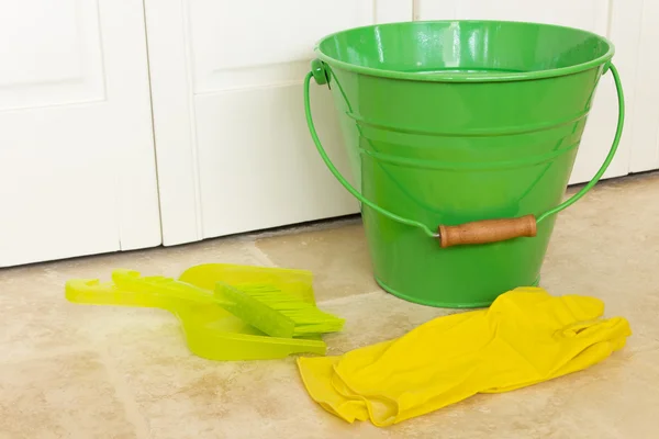 Green Bucket and Yellow Gloves — Stock Photo, Image