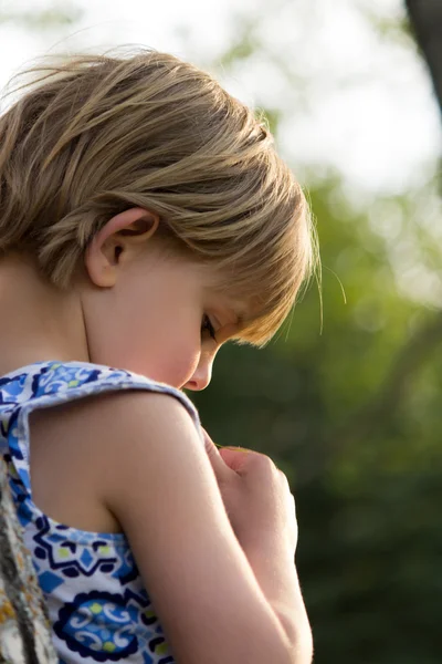 Young Girl in Thought Leaning Against a Tree — Stock Photo, Image