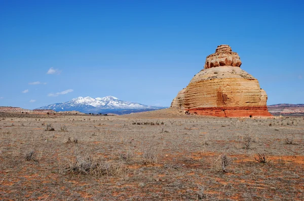 La Sal Mountains and the lonely Church rock Stock Picture