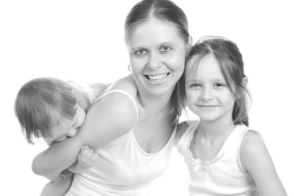 Mother with daughters isolated on white — Stock Photo, Image