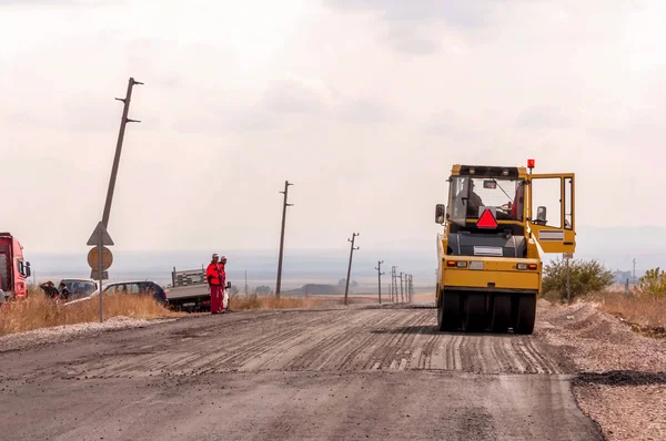 Construção e reparação de estradas e estradas — Fotografia de Stock