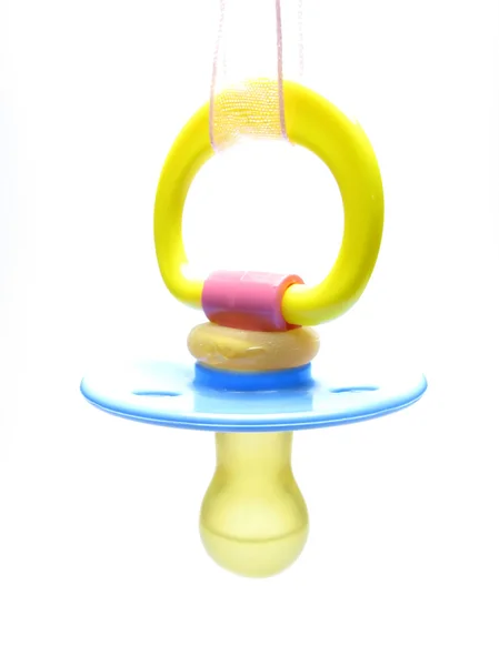 Pezón de goma para niños en cinta — Foto de Stock