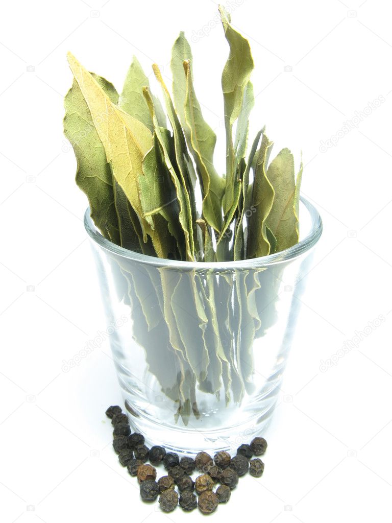 black pepper and bay leaf in a glass