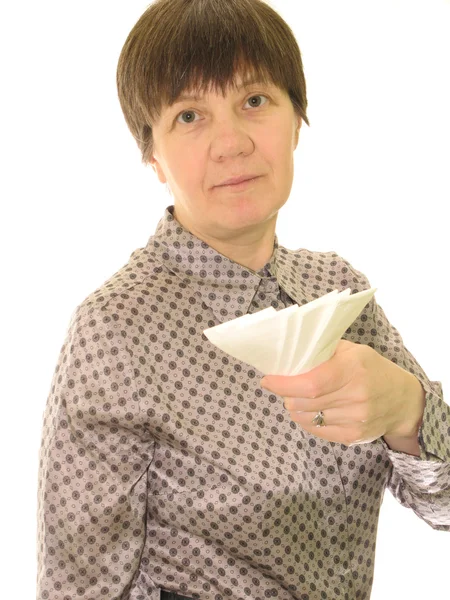 A woman with a paper handkerchief on a white background — Stock Photo, Image