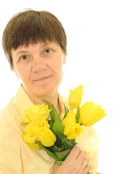 Mulher com flores amarelas — Fotografia de Stock