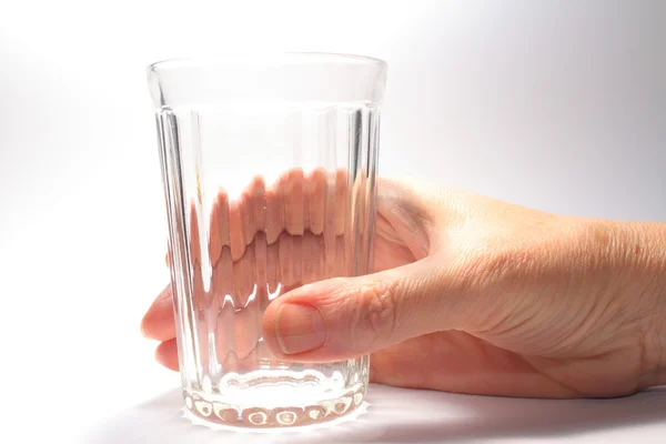 Hand and glass — Stock Photo, Image