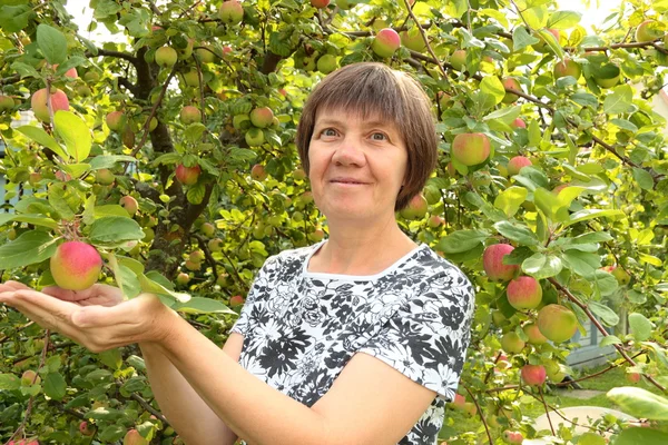 Middle-aged woman in the garden