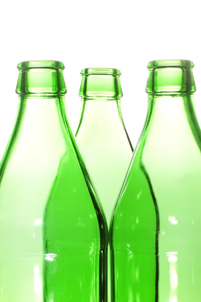 Tres botellas de vidrio cuello —  Fotos de Stock