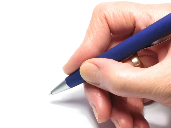 Women's arm with a ballpoint pen. — Stock Photo, Image