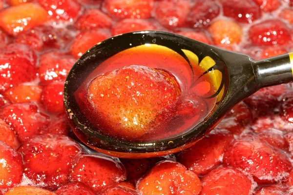Strawberries cooked in a spoon — Stock Photo, Image