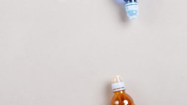Stop motion animation. Isotonic electrolyte sports drink. Two bottles. 4k