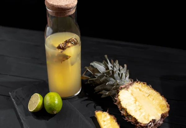 Fermented Pineapple Kombucha Drink - Tepache. Homemade probiotic superfood tea with juice. Healthy flavored drink. Copy space