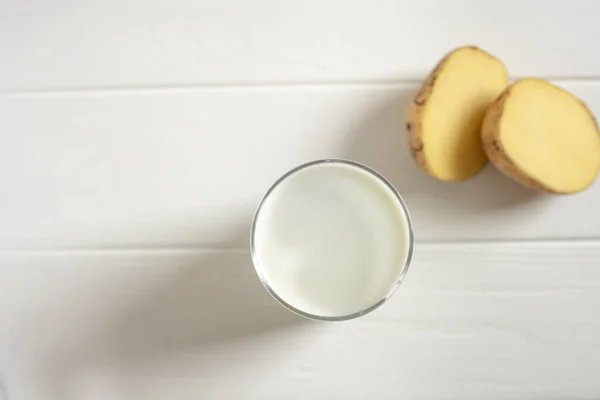 A glass of potato milk top view — Fotografia de Stock