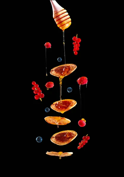 Pancakes Fruit Honey Black Background Flying Air Mini Pancakes Blueberries — Stok fotoğraf