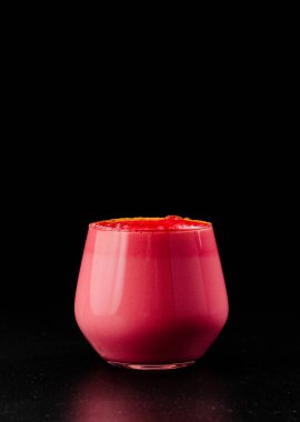 Life without coffee. Beetroot-based latte. Healthy Eating. Beet latte on black background.