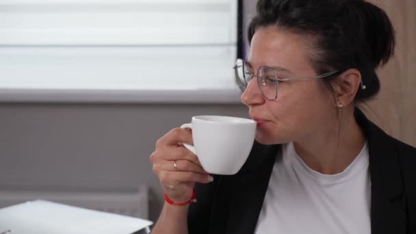 Office Break Girl Drinking Coffee Resting While Working — Videoclip de stoc