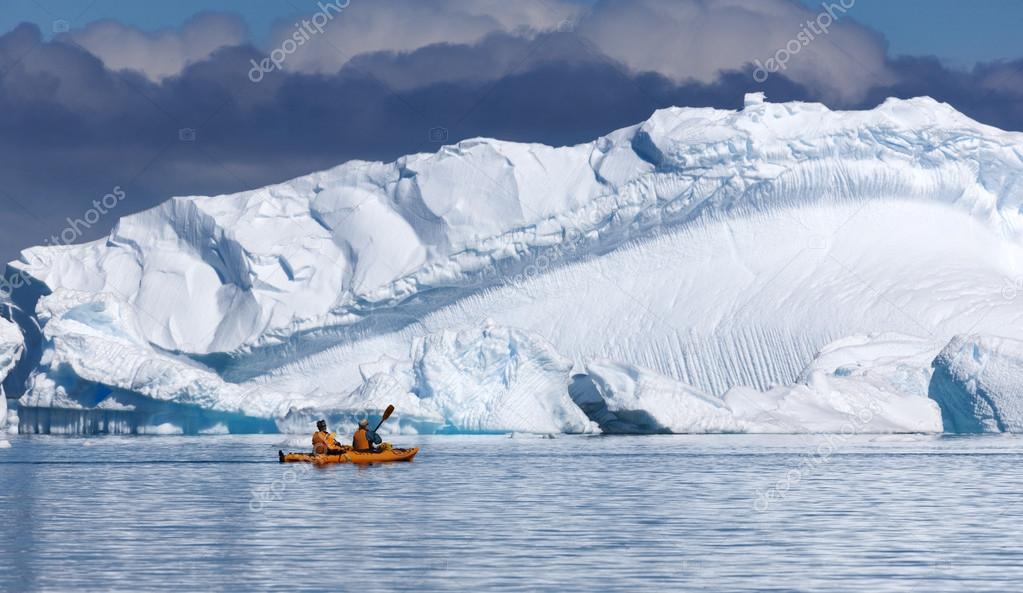 Nature of Antarctic Peninsula. Ices and icebergs. Travel on deep pure waters among glaciers of Antarctica. Fantastic snow landscapes.