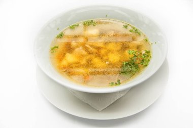 Sebze ve bitkilerle dolu zengin bir çorba.