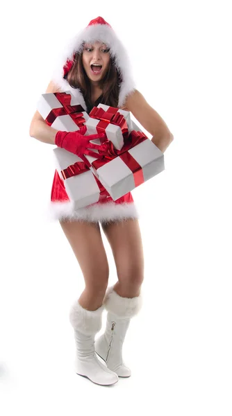 Santa helper girl almost dropped the gift boxes — Stock Photo, Image