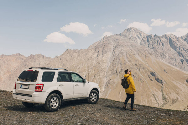 Hiker Backpack Admires Mountain View His All Terrain Car Suv Stock Image