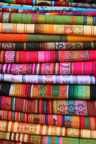 Stacked Table Linens in Otavalo — Stock Photo, Image