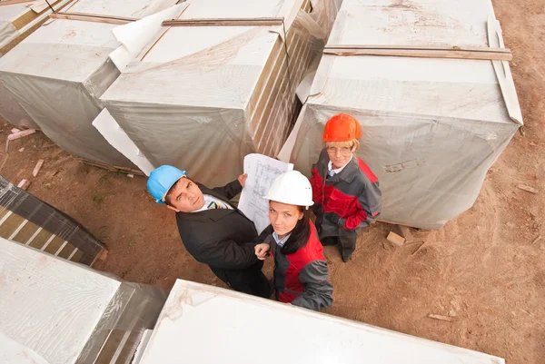 Group of engineers at construction site — Stock Photo, Image